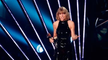 INGLEWOOD, CALIFORNIA - APRIL 03: Recording artist Taylor Swift accepts the award for 'Album of the Year,' for '1989,' onstage at the iHeartRadio Music Awards which broadcasted live on TBS, TNT, AND TRUTV from The Forum on April 3, 2016 in Inglewood, California. (Photo by Rich Polk/Getty Images for iHeartRadio / Turner)