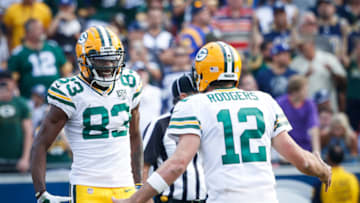 LOS ANGELES, CA - OCTOBER 28: Wide receiver Marquez Valdes-Scantling #83 and quarterback Aaron Rodgers #12 of the Green Bay Packers celebrate after a touchdown in the fourth quarter against the Los Angeles Rams at Los Angeles Memorial Coliseum on October 28, 2018 in Los Angeles, California. (Photo by Joe Robbins/Getty Images)