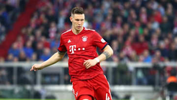 MUNICH, GERMANY - APRIL 06: Niklas Suele of FC Bayern Muenchen controls the ball during the Bundesliga match between FC Bayern Muenchen and Borussia Dortmund at Allianz Arena on April 6, 2019 in Munich, Germany. (Photo by TF-Images/Getty Images)