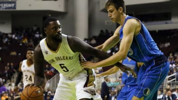 Oct 1, 2016; Bossier City, LA, USA; New Orleans Pelicans guard Lance Stephenson (5) dribbles on Dallas Mavericks forward Nicolas Brussino (9) during the second half at CenturyLink Center. New Orleans won 116-102. Mandatory Credit: Ray Carlin-USA TODAY Sports