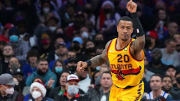PHILADELPHIA, PA - DECEMBER 23: John Collins #20 of the Atlanta Hawks reacts against the Philadelphia 76ers at the Wells Fargo Center on December 23, 2021 in Philadelphia, Pennsylvania. The Hawks defeated the 76ers 98-96. NOTE TO USER: User expressly acknowledges and agrees that, by downloading and or using this photograph, User is consenting to the terms and conditions of the Getty Images License Agreement. (Photo by Mitchell Leff/Getty Images)