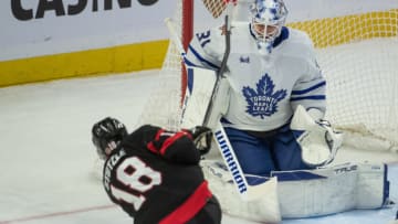 Dec 7, 2023; Ottawa, Ontario, CAN; Toronto Maple Leafs goalie Martin Jones (31) makes a save on a shot from Ottawa Senators center Tim Stutzle (18) in the third period at the Canadian Tire Centre. Mandatory Credit: Marc DesRosiers-USA TODAY Sports