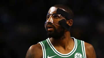 BOSTON, MA - NOVEMBER 16: Kyrie Irving #11 of the Boston Celtics, wearing a mask due to a facial fracture, looks on during the first quarter against the Golden State Warriors at TD Garden on November 16, 2017 in Boston, Massachusetts. (Photo by Maddie Meyer/Getty Images)