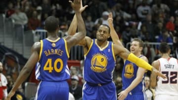 Jan 3, 2014; Atlanta, GA, USA; Golden State Warriors small forward Harrison Barnes (40) shows emotion with small forward Andre Iguodala (9) against the Atlanta Hawks in the fourth quarter at Philips Arena. The Warriors defeated the Hawks 101-100. Mandatory Credit: Brett Davis-USA TODAY Sports