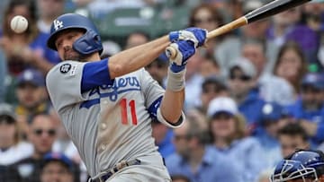 CHICAGO, ILLINOIS - APRIL 25: A.J. Pollock #11 of the Los Angeles Dodgers fouls off a pitch against the Chicago Cubs at Wrigley Field on April 25, 2019 in Chicago, Illinois. The Dodgers defeated the Cubs 2-1. (Photo by Jonathan Daniel/Getty Images)