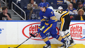 Oct 6, 2023; Buffalo, New York, USA; Buffalo Sabres right wing Tage Thompson (72) checks Pittsburgh Penguins defenseman Marcus Pettersson (28) as he goes after a loose puck during the second period at KeyBank Center. Mandatory Credit: Timothy T. Ludwig-USA TODAY Sports