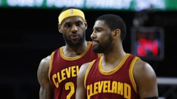 Feb 24, 2015; Auburn Hills, MI, USA; Cleveland Cavaliers forward LeBron James (23) talks to guard Kyrie Irving (2) during the fourth quarter against the Detroit Pistons at The Palace of Auburn Hills. Cavs beat the Pistons 102-93. Mandatory Credit: Raj Mehta-USA TODAY Sports