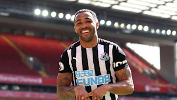LIVERPOOL, ENGLAND - APRIL 24: Callum Wilson of Newcastle United celebrates after scoring a goal which was later disallowed due to a handball during the Premier League match between Liverpool and Newcastle United at Anfield on April 24, 2021 in Liverpool, England. Sporting stadiums around the UK remain under strict restrictions due to the Coronavirus Pandemic as Government social distancing laws prohibit fans inside venues resulting in games being played behind closed doors. (Photo by David Klein - Pool/Getty Images)