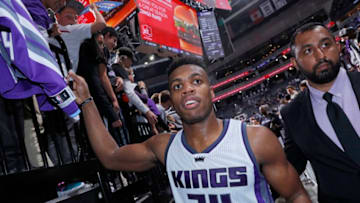 SACRAMENTO, CA - APRIL 11: Buddy Hield #24 of the Sacramento Kings greets fans before heading into the tunnel after the game against the Phoenix Suns on April 11, 2017 at Golden 1 Center in Sacramento, California. NOTE TO USER: User expressly acknowledges and agrees that, by downloading and or using this photograph, User is consenting to the terms and conditions of the Getty Images Agreement. Mandatory Copyright Notice: Copyright 2017 NBAE (Photo by Rocky Widner/NBAE via Getty Images)
