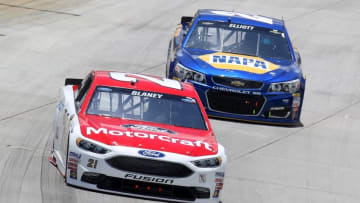 May 15, 2016; Dover, DE, USA; NASCAR Sprint Cup Series driver Ryan Blaney (21) leads driver Chase Elliott (24) during the AAA 400 Drive For Autism at Dover International Speedway. Mandatory Credit: Matthew O
