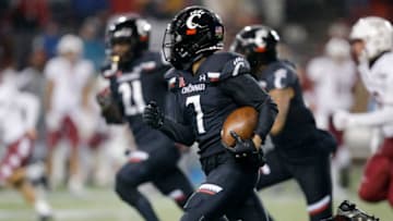 Cincinnati Bearcats cornerback Coby Bryant returns a blocked punt against Temple Owls at Nippert Stadium. Cincinnati Athletics.