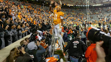 Nov 19, 2016; Knoxville, TN, USA; Tennessee Volunteers quarterback Joshua Dobbs (11) directs the band after the game against the Missouri Tigers at Neyland Stadium. Tennessee won 63 to 37. Mandatory Credit: Randy Sartin-USA TODAY Sports