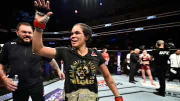 EDMONTON, AB - SEPTEMBER 09: Amanda Nunes of Brazil celebrates her victory over Valentina Shevchenko of Kyrgyzstan in their women's bantamweight bout during the UFC 215 event inside the Rogers Place on September 9, 2017 in Edmonton, Alberta, Canada. (Photo by Jeff Bottari/Zuffa LLC/Zuffa LLC via Getty Images)