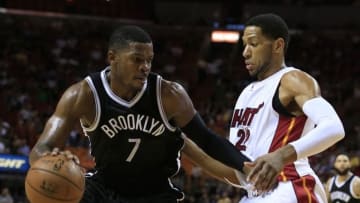 Jan 4, 2015; Miami, FL, USA; Brooklyn Nets forward Joe Johnson (7) drives to the basket as Miami Heat forward Danny Granger defends in the first half at American Airlines Arena. Mandatory Credit: Robert Mayer-USA TODAY Sports
