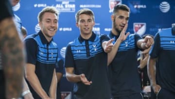 Jul 27, 2015; Denver, CO, USA; Tottenham Hotspur players play shuffleboard at the MLS All-Star welcome reception at Union Station. Mandatory Credit: Isaiah J. Downing-USA TODAY Sports