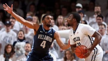 Feb 14, 2015; Indianapolis, IN, USA; Butler Bulldogs forward Roosevelt Jones (21) is guarded by Villanova Wildcats guard Darrun Hilliard (4) at Hinkle Fieldhouse. Mandatory Credit: Brian Spurlock-USA TODAY Sports