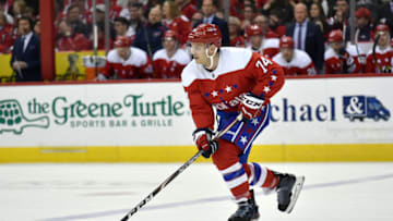 WASHINGTON, DC - MARCH 26: Washington Capitals defenseman John Carlson (74) stickhandles the puck out of his own end during the Carolina Hurricanes vs. Washington Capitals NHL game March 26, 2019 at Capital One Arena in Washington, D.C.. (Photo by Randy Litzinger/Icon Sportswire via Getty Images)