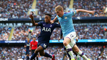 MANCHESTER, ENGLAND - AUGUST 17: Kevin De Bruyne of Manchester City challenges for the ball with Kyle Walker-Peters of Tottenham Hotspur during the Premier League match between Manchester City and Tottenham Hotspur at Etihad Stadium on August 17, 2019 in Manchester, United Kingdom. (Photo by Clive Brunskill/Getty Images)