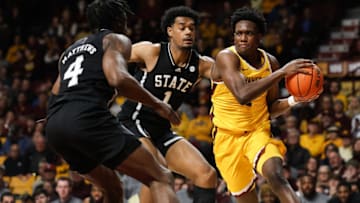 Dec 11, 2022; Minneapolis, Minnesota, USA; Minnesota Golden Gophers forward Joshua Ola-Joseph (1) looks to pass while Mississippi State Bulldogs forward Tolu Smith (1) and guard Cameron Matthews (4) defends during the first half at Williams Arena. Mandatory Credit: Matt Krohn-USA TODAY Sports