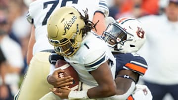 Auburn footballAUBURN, ALABAMA - SEPTEMBER 04: Defensive end Derick Hall #29 of the Auburn Tigers sacks quarterback Kato Nelson #1 of the Akron Zips during the first quarter of play at Jordan-Hare Stadium on September 04, 2021 in Auburn, Alabama. (Photo by Michael Chang/Getty Images)