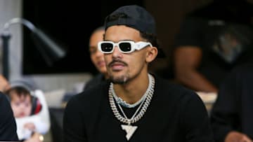 Sep 11, 2022; Atlanta, Georgia, USA; Atlanta Hawks guard Trae Young (11) sits in a suite before a game between the Atlanta Falcons and New Orleans Saints at Mercedes-Benz Stadium. Mandatory Credit: Brett Davis-USA TODAY Sports