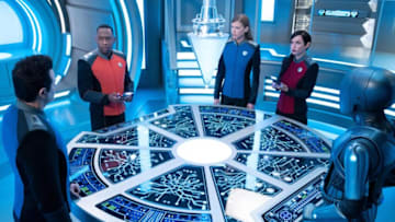 The Orville: New Horizons -- “Twice In A Lifetime” - Episode 306 -- The Orville crew sets out to rescue Gordon on a distant yet familiar world, dealing with potentially permanent consequences along the way. Capt. Ed Mercer (Seth MacFarlane), Lt. Cmdr. John LaMarr (J Lee), Cmdr. Kelly Grayson (Adrianne Palicki), Lt. Talla Keyali (Jessica Szohr), and Isaac (Mark Jackson), shown. (Photo by: Greg Gayne/Hulu)