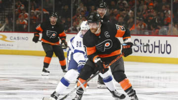 PHILADELPHIA, PA - JANUARY 11: Claude Giroux #28 of the Philadelphia Flyers controls the puck against Steven Stamkos #91 of the Tampa Bay Lightning at the Wells Fargo Center on January 11, 2020 in Philadelphia, Pennsylvania. The Lightning defeated the Flyers 1-0. (Photo by Mitchell Leff/Getty Images)