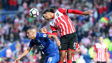 LEICESTER, ENGLAND - OCTOBER 02 : Islam Slimani of Leicester City in action with Virgil Van Dijk of Southampton during the Barclays Premier League match between Leicester City and Southampton at the King Power Stadium on October 2nd , 2016 in Leicester, United Kingdom. (Photo by Plumb Images/Leicester City FC via Getty Images)