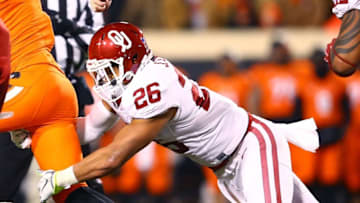 Nov 28, 2015; Stillwater, OK, USA; Oklahoma Sooners linebacker Jordan Evans (26) against the Oklahoma State Cowboys at Boone Pickens Stadium. The Sooners defeated the Cowboys 58-23. Mandatory Credit: Mark J. Rebilas-USA TODAY Sports