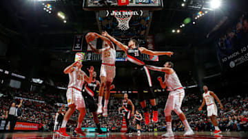 ATLANTA, GA - DECEMBER 30: John Collins #20 of the Atlanta Hawks grabs a rebound against Zach Collins #33 of the Portland Trail Blazers at Philips Arena on December 30, 2017 in Atlanta, Georgia. NOTE TO USER: User expressly acknowledges and agrees that, by downloading and or using this photograph, User is consenting to the terms and conditions of the Getty Images License Agreement. (Photo by Kevin C. Cox/Getty Images)