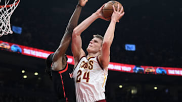 Mar 24, 2022; Toronto, Ontario, CAN; Cleveland Cavaliers forward Lauri Markkanen (24) shoots for a basket against Toronto Raptors forward Precious Achiuwa (5) in the first half at Scotiabank Arena. Mandatory Credit: Dan Hamilton-USA TODAY Sports
