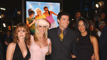 (L-R): Co-stars Taryn Manning, Britney Spears, Anson Mounnt and Zoe Saldana at the premiere of "Crossroads." (Photo by Frank Trapper/Corbis via Getty Images)