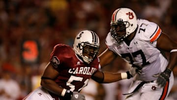 Auburn footballSep 28, 2006; Columbia, SC, USA; South Carolina Gamecocks defensive end (51) Casper Brinkley gets by Auburn Tigers offensive tackle (77) King Dunlap on his way to sacking Auburn quarterback (12) Brandon Coxduring the 1st quarter at Williams-Brice Stadium in Columbia, SC. Mandatory Credit: Paul Abell-USA TODAY Sports Copyright © Paul Abell