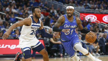 Orlando Magic guard Terrence Ross drives around Minnesota Timberwolves guard Josh Okogie. Mandatory Credit: Reinhold Matay-USA TODAY Sports