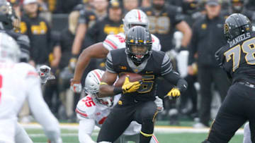 IOWA CITY, IOWA- NOVEMBER 04: Running back Akrum Wadley #25 of the Iowa Hawkeyes is tackled during the first quarter by linebacker Chris Worley #35 of the Ohio State Buckeyes on November 04, 2017 at Kinnick Stadium in Iowa City, Iowa. (Photo by Matthew Holst/Getty Images)