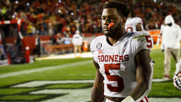Oct 3, 2020; Ames, Iowa, USA; Oklahoma running back T.J. Pledger (5) walks off the field after the Sooners fell to Iowa State 37-30. Mandatory Credit: Brian Powers-USA TODAY Sports