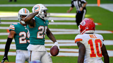 Dec 13, 2020; Miami Gardens, Florida, USA; Miami Dolphins cornerback Xavien Howard (25) celebrates after intercepting a pass intended for Kansas City Chiefs wide receiver Tyreek Hill (10) during the second half at Hard Rock Stadium. Mandatory Credit: Jasen Vinlove-USA TODAY Sports
