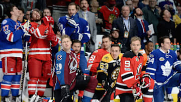 LOS ANGELES, CA - JANUARY 28: (R-L) Auston Matthews #34 of the Toronto Maple Leafs, Wayne Simmonds #17 of the Philadelphia Flyers, Taylor Hall #9 of the New Jersey Devils, Brad Marchand #63 of the Boston Bruins, Frans Nielsen #51 of the Detroit Red Wings, Erik Karlsson #65 of the Ottawa Senators, Victor Hedman #77 of the Tampa Bay Lightning, Nathan MacKinnon #29 of the Colorado Avalanche, Justin Faulk #27 of the Carolina Hurricanes and Ryan McDonagh #27 of the New York Rangers look on during the 2017 Coors Light NHL All-Star Skills Competition at Staples Center on January 28, 2017 in Los Angeles, California. (Photo by Andrew D. Bernstein/NHLI via Getty Images)