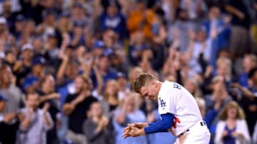 LOS ANGELES, CA - SEPTEMBER 19: Enrique Hernandez #14 of the Los Angeles Dodgers celebrates his run to tie the Colorado Rockies 2-2 during the fifth inning at Dodger Stadium on September 19, 2018 in Los Angeles, California. (Photo by Harry How/Getty Images)