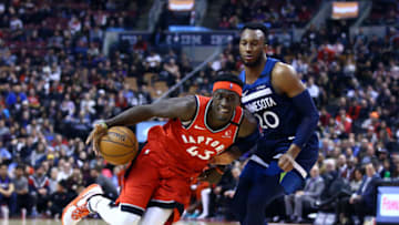 TORONTO, ON - FEBRUARY 10: Pascal Siakam #43 of the Toronto Raptors dribbles the ball as Josh Okogie #20 of the Minnesota Timberwolves defends. (Photo by Vaughn Ridley/Getty Images)