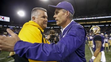 Nov 19, 2016; Seattle, WA, USA; Arizona State Sun Devils head coach Todd Graham (left) shakes hands with Washington Huskies head coach Chris Petersen after their game at Husky Stadium. Washington won 44-18. Mandatory Credit: Jennifer Buchanan-USA TODAY Sports