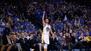 OAKLAND, CA - JANUARY 25: Stephen Curry #30 of the Golden State Warriors watches a three-point basket go in against the San Antonio Spurs at ORACLE Arena on January 25, 2016 in Oakland, California. NOTE TO USER: User expressly acknowledges and agrees that, by downloading and or using this photograph, User is consenting to the terms and conditions of the Getty Images License Agreement. (Photo by Ezra Shaw/Getty Images)