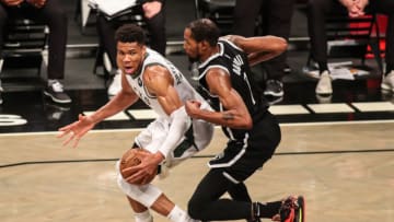 Jun 19, 2021; Brooklyn, New York, USA; Milwaukee Bucks forward Giannis Antetokounmpo (34) and Brooklyn Nets forward Kevin Durant (7) during game seven in the second round of the 2021 NBA Playoffs at Barclays Center. Mandatory Credit: Wendell Cruz-USA TODAY Sports