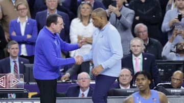 Duke basketball head coach Mike Krzyzewski and UNC head coach Hubert Davis (Stephen Lew-USA TODAY Sports)