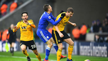 WOLVERHAMPTON, ENGLAND - JANUARY 19: Ryan Bennett of Wolverhampton Wanderers clashes with Jamie Vardy of Leicester City during the Premier League match between Wolverhampton Wanderers and Leicester City at Molineux on January 19, 2019 in Wolverhampton, United Kingdom. (Photo by Clive Mason/Getty Images)