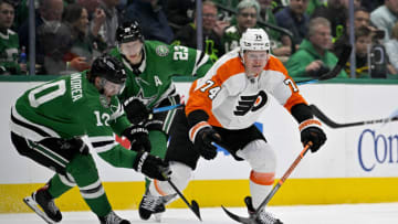 Apr 6, 2023; Dallas, Texas, USA; Dallas Stars center Ty Dellandrea (10) and Philadelphia Flyers right wing Owen Tippett (74) chase the puck at center ice during the third period at the American Airlines Center. Mandatory Credit: Jerome Miron-USA TODAY Sports