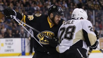 Feb 24, 2016; Boston, MA, USA; Boston Bruins left wing Zac Rinaldo (36) battles with Pittsburgh Penguins defenseman Ian Cole (28) during the third period at TD Garden. The Boston Bruins won 5-1. Mandatory Credit: Greg M. Cooper-USA TODAY Sports