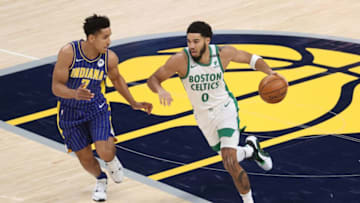 INDIANAPOLIS, INDIANA - DECEMBER 27: Jayson Tatum #0 of the Boston Celtics dribbles the ball against the Indiana Pacers at Bankers Life Fieldhouse on December 27, 2020 in Indianapolis, Indiana. NOTE TO USER: User expressly acknowledges and agrees that, by downloading and or using this photograph, User is consenting to the terms and conditions of the Getty Images License Agreement. (Photo by Andy Lyons/Getty Images)