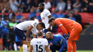 LONDON, ENGLAND - SEPTEMBER 11: Eric Dier of Tottenham Hotspur receives medical treatment before being substituted during the Premier League match between Crystal Palace and Tottenham Hotspur at Selhurst Park on September 11, 2021 in London, England. (Photo by Paul Harding/Getty Images)