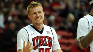 UNLV Runnin' Rebels guard Dantley Walker talks with a teammate near the end of a game against Southern Utah at Thomas & Mack Center. UNLV won the game 79-45. Mandatory Credit: Stephen R. Sylvanie-USA TODAY Sports
